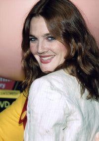 Drew Barrymore looking over shoulder in white jacket photo print