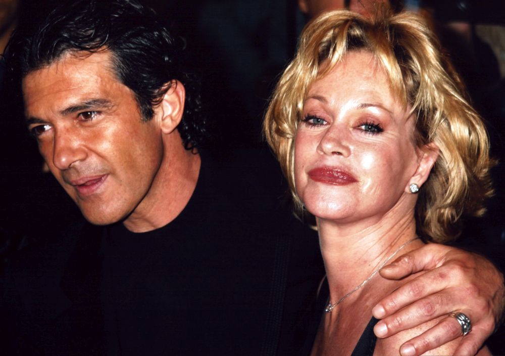 Antonio Banderas and Melanie Griffith candid photo print.