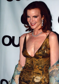 Marcia Cross in a gold floral dress and shawl photo print