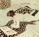 The Flowered Shawl Poster Print by George Sheringham