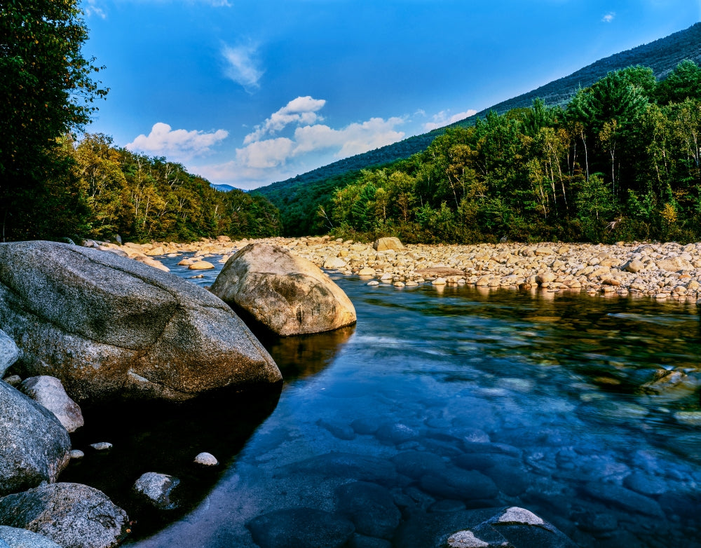 Swift River flowing through a lush forest along Kancamagus Highway in New Hampshire poster print.