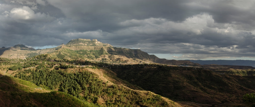 Elevated view landscape poster of Lalibela, Ethiopia at dusk.