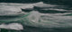 Surfing at Cape Kiwanda State Park Poster Print showcasing surfers against the Oregon coast.