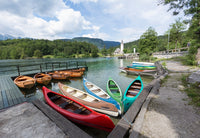 Lake Bohinj poster print featuring Triglav National Park in Slovenia with canoes and the church of St. John