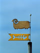 Low angle view of a weather vane poster print by Panoramic Images.