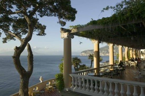 Group of people dining at Imperial Tramontano restaurant in Sorrento, Italy poster print.
