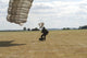 Pathfinder Platoon member collapsing parachute after HALO jump poster print.