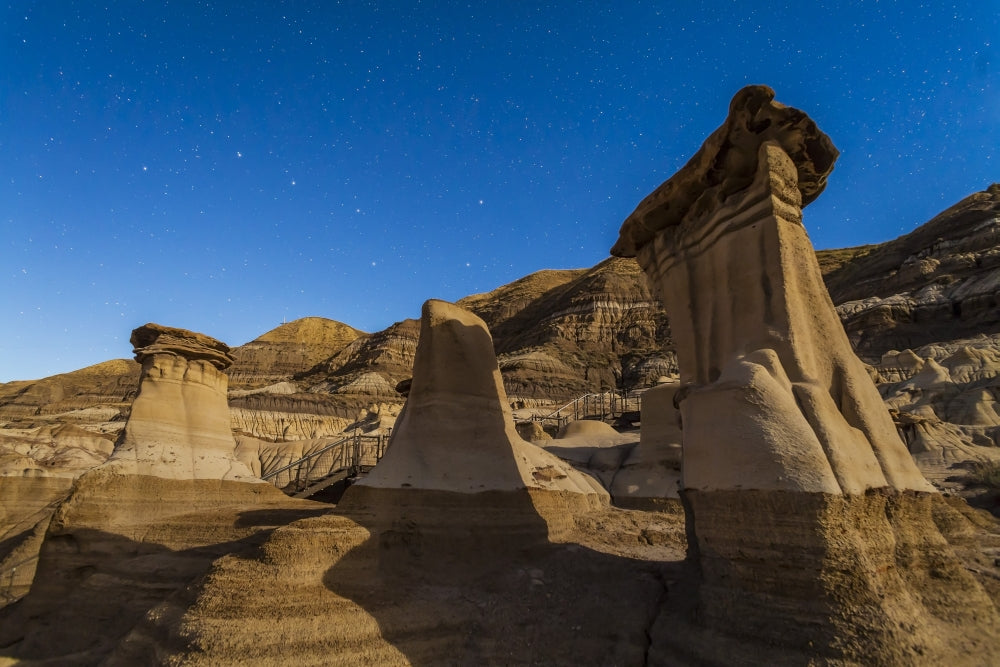 Stars Over the Hoodoos in the Red Deer River Valley Poster Print