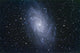 The Triangulum Galaxy (NGC 598) Poster Print showcasing cosmic beauty.