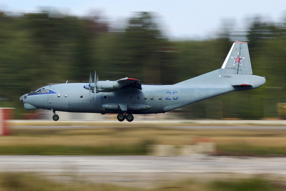 An-12 Transport Aircraft landing poster print by Stocktrek Images.