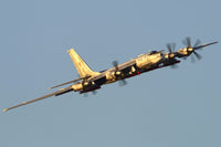 Tu-95MSM strategic bomber with X-101 missiles performing test flight poster print.