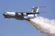 Il-76MD Russian Air Force performing water drop maneuver poster print.