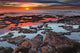 Tidal Pools at Sunrise Poster Print showcasing vibrant colors and reflections in Miramar, Argentina.