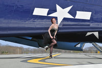 1940s pin-up girl poster print in cocktail dress with TBM Avenger aircraft.