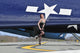 1940s pin-up girl poster print in cocktail dress with TBM Avenger aircraft.