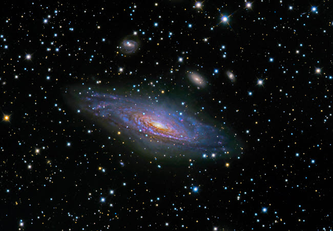 NGC7331 Galaxy and companion galaxies poster print by Ken Crawford, showcasing cosmic beauty.