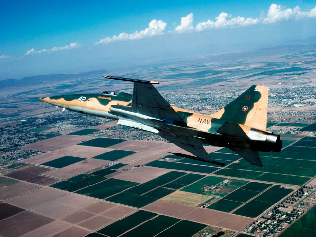 F-5E Tiger II in flight over El Centro, California poster print by Dave Baranek