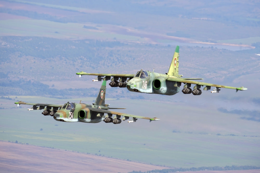 Bulgarian Air Force Sukhoi Su-25s flying over Graf Ignatievo Air Base Poster Print