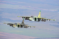 Bulgarian Air Force Sukhoi Su-25s flying over Graf Ignatievo Air Base Poster Print