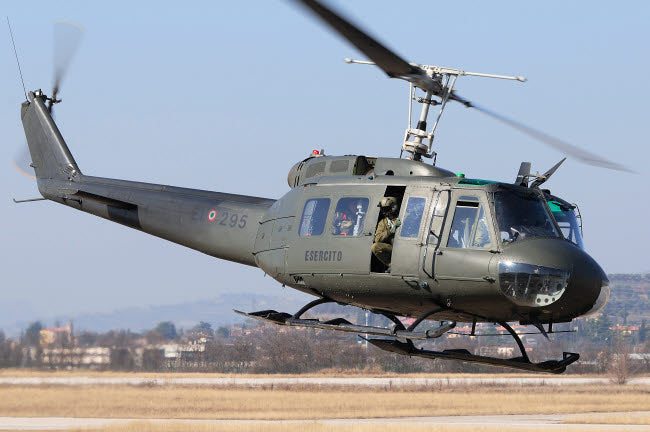 Italian Army AB-205 helicopter taking off poster print by Daniele Faccioli.