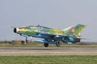 Romanian Air Force MiG-21UM Lancer-B landing on runway poster print