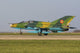 MiG-21UM Lancer-B landing at an airbase in Romania poster print.