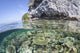 Vibrant coral reef near limestone islands in Raja Ampat poster print.
