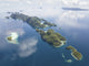 Aerial view of limestone islands in Raja Ampat, Indonesia.