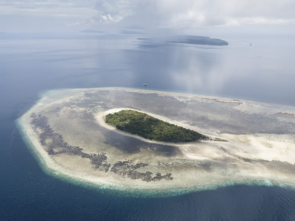 Pulau Koon Island Poster Print showcasing serene tropical landscape by Ethan Daniels.