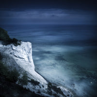 Aerial view of chalk mountains and sea at Mons Klint cliffs in Denmark.