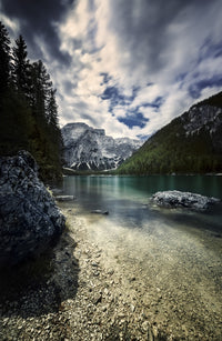 Lake Braies and Dolomite Alps poster print showcasing stormy clouds in Northern Italy