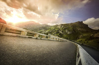Old cobblestone road at sunset with moody sky - fine art print