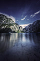 Lake Braies and Dolomite Alps poster print showcasing serene waters and majestic mountains.