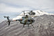 Poster print of two Breda Nardi NH-500 helicopters flying over Frosinone, Italy.