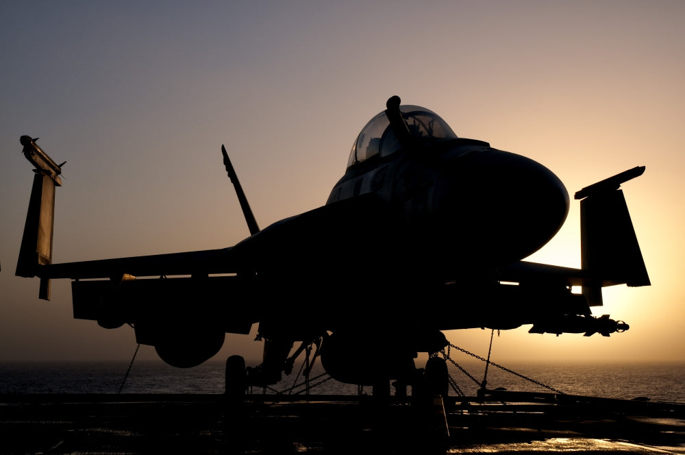Silhouette of US Navy F/A-18E Super Hornet on USS Nimitz Poster Print