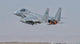 Royal Saudi Air Force F-15 in flight poster print over Spain.