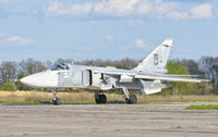Ukrainian Air Force Su-24 aircraft at Lutsk Air Base poster print.