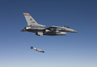 F-16 Fighting Falcon releasing GBU-31 JDAM during test mission poster print.