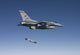 F-16 Fighting Falcon releasing GBU-31 JDAM during test mission poster print.