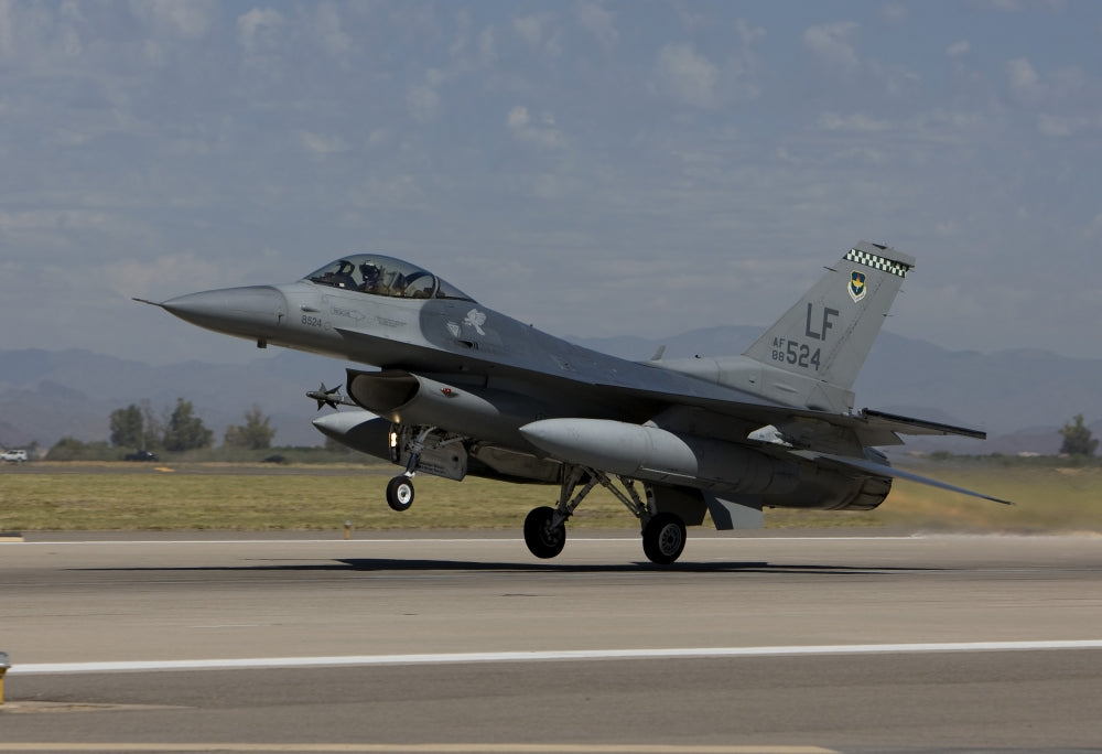 F-16 Fighting Falcon taking off on a training mission poster print.