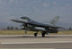 F-16 Fighting Falcon taking off on a training mission poster print.