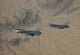 F-16 Fighter Jets in training mission over Arizona desert poster print