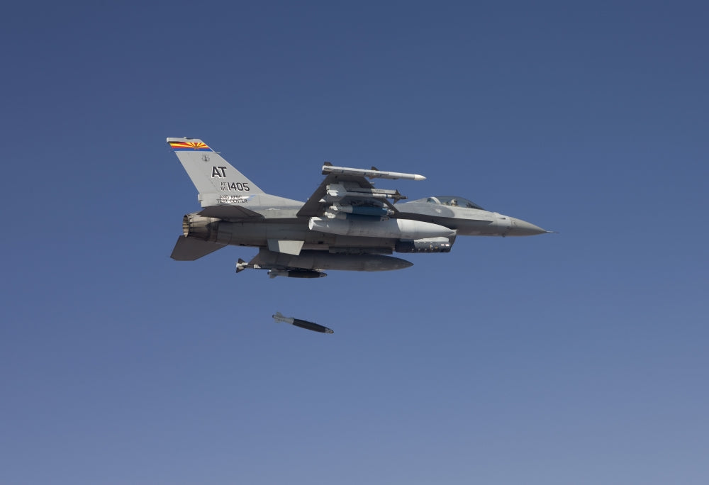 F-16 Fighting Falcon releasing GBU-38 JDAM during test mission poster print.