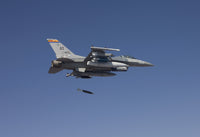 F-16 Fighting Falcon releasing GBU-38 JDAM during test mission poster print.