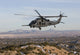 HH-60G Pave Hawk flying during a training mission at Kirtland Air Force Base, New Mexico