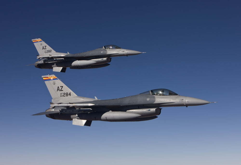 F-16 Fighter Jets in formation during training mission poster print.