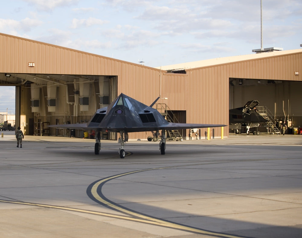 F-117 Nighthawk taxiing out of hangar at Holloman Air Force Base.