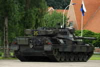 The Leopard 1A5 MBT of the Belgian Army Poster Print showcasing the tank in action.