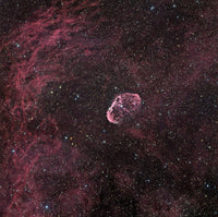 The Crescent Nebula NGC 6888 Poster Print showcasing vibrant cosmic colors.