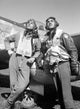 Tuskegee Airmen P-51D Aircraft Poster Print featuring Benjamin O. Davis and Edward C. Gleed